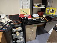 Wide view showing storage unit, wooden box, calligraphy kits and tabletop items