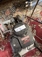 Top and front view of the Craftsman edger showing brand, model, and HP information, with pull start cord visible.