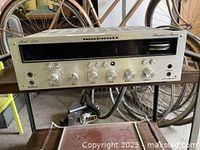 Full front view showing faceplate, control layout, and overall condition