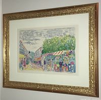 Full view of print in gold decorative frame hung on wall