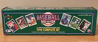 Boxed packaging of the 1990 MLB baseball card complete set with visible artwork and text highlighting the set contents.