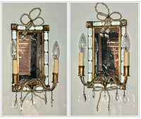 Pair of Venetian glass and brass wall sconces with mirrored backplates and two electric candle bulbs each, detailed with braided glass ropes and hanging crystals
