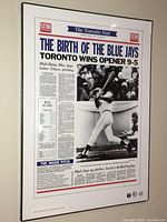 Front view of the framed reprint featuring the Blue Jays baseball player and headlines.