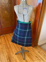 Front view of wool tartan kilt on dummy