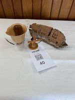 group shot of driftwood carving, windmill, and yew cup