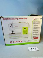 Front of original Singer Sew Mate 5400 box showing product image and branding