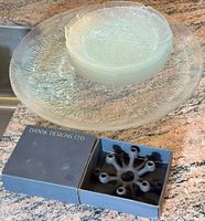 DANSK spider web cast iron candle holder in original box with Arcoroc Aspen leaf plates and Iittala serving platter in background