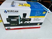 Box front view showing Burcam brand 1/3 HP laundry tube pump with specs and features.