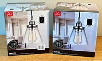 Two boxed new Globe Parker pendant lights, chrome finish with clear glass shades and fabric cords