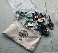 Overview of various padlocks and key sets with Klein Tools canvas pouch