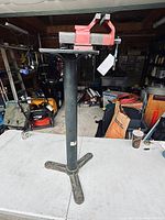 Full view of the Record bench vise mounted on the metal work base stand with tripod base.