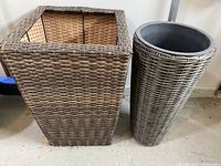 Photo showing two wicker planters, one rectangular and one tall tapered round shape, made of synthetic rattan with visible interior and plastic liner in one.
