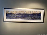 Full view of the framed mixed media print showing the overall artwork in shades of blue, gold, and silver with textured metallic effects.