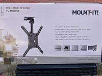 Box front showing image of foldable ceiling TV mount MI-4225 with key features listed.
