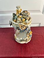 Front angle showing bear chef with bread and kitchen items on top, glass body with bear and kitchen-themed resin decorations