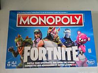 Front box cover showing Monopoly Fortnite branding and Fortnite characters
