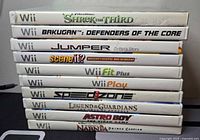 Photo of 10 Nintendo Wii game cases stacked horizontally showing titles