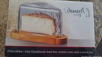 Box image showing boxed cheese dome with wooden base, with product name and description by Denizli Handmade.