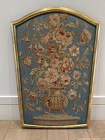 Full front view of tapestry in giltwood frame