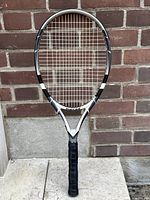 Front full view of Babolat Drive Z 110 tennis racket showing overall condition and design.