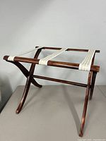 Three-quarter view of the wooden frame and fabric straps