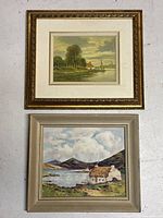 Pair of vintage paintings stacked on floor, showing overall size and frames