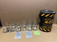 Full lot showing 12 glasses, three paper inserts, and Kodacolor 400 cooler
