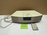 Front and top view of Bose Wave Radio with remote