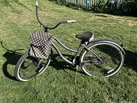 Full view of Huffy cruiser bicycle on grass