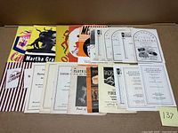 Group view of entire lot spread out, showing variety of playbills and programs