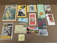 All paper items laid out on flat surface