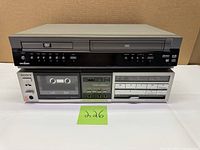 Front view of both stacked components showing brand names, model identifiers and control panels