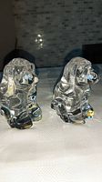 Pair of clear crystal spaniel paperweights viewed from the front