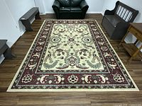 Full view of the rug on a wood floor with furniture around