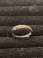 Top-down photo of the sterling silver Swarovski ring showing the crystal-embedded top band and polished silver finish.