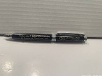 Side view showing inscription 'Father John T. Belger (Council 6161) St. Francis De Sales Parish, Ala.' and clip band reading '50th Anniversary'.