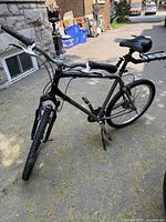 Side view of the Giant Sedona bicycle showing entire frame, tires, saddle, and rear rack