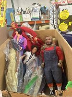Box overview showing all figures and dolls piled together