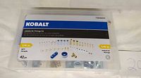 Front of sealed Kobalt Jobsite Air Fittings Kit showing branding, 1/4 in, 42 pc, NPT