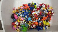 Tub containing full assortment of Paw Patrol figures