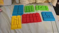 All six silicone molds laid out, showing colors and brick pattern