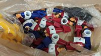 Bag containing assorted new plastic foosball men pieces