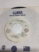 7-inch vinyl record by Los Lobos with song La Bamba on side A, Warner/Elektra/Atlantic label.