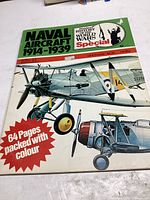 Front cover of the booklet showing the title, series name, aircraft illustrations, and 64 pages packed with color.