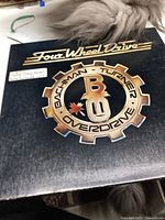 Front cover of Bachman-Turner Overdrive Four Wheel Drive vinyl album showing band logo and title.