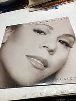 Front cover of the Mariah Carey Music Box album showing the artist's face