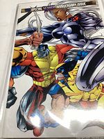 Comic book cover showing X-Men Special Anniversary Issue with Wolverine and Storm on the cover.
