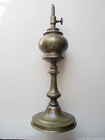 Full view of antique French brass paraffin/kerosene lamp showing overall design and condition