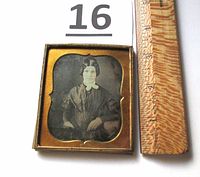 Front view of daguerreotype photograph with ruler showing size approximately 2.75 by 3.25 inches.