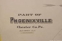 Close-up photo of a map title area showing 'Part of Phoenixville Chester Co. Pa.' with scale 300 feet to inch, copyright 1883 by W.M. Breous.